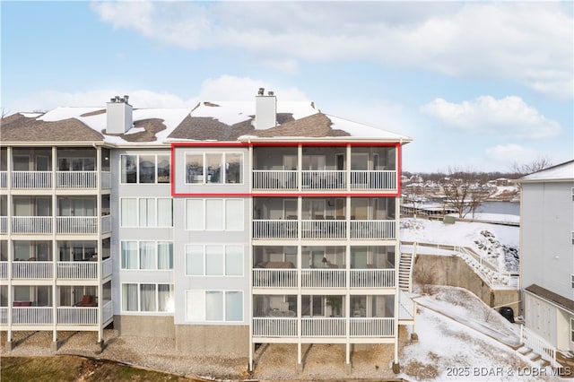 view of snow covered building