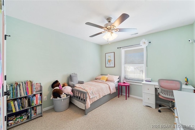 bedroom featuring light carpet, a ceiling fan, visible vents, and baseboards