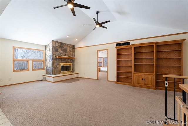 unfurnished living room with carpet, a fireplace, baseboards, and ceiling fan