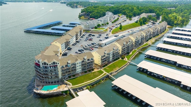 birds eye view of property featuring a water view