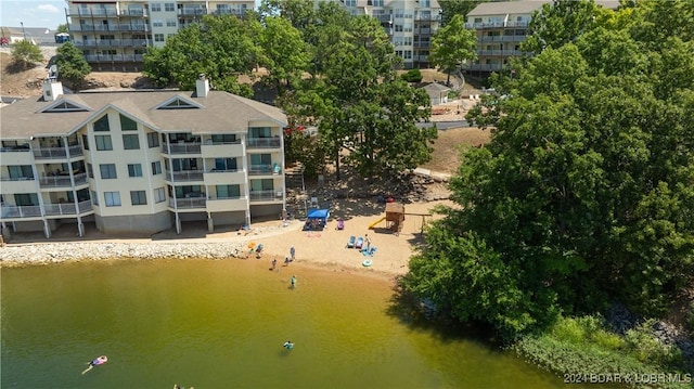 birds eye view of property featuring a water view