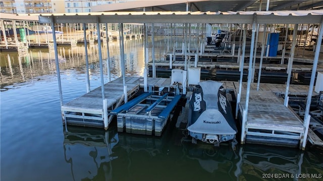 view of dock with a water view