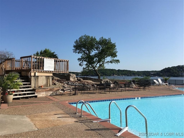 152 Falls Point Dr Unit 1A, Lake Ozark, MO 65049 - community pool with stairway and a wooden deck