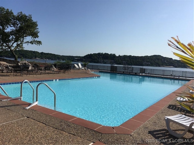 community pool with fence