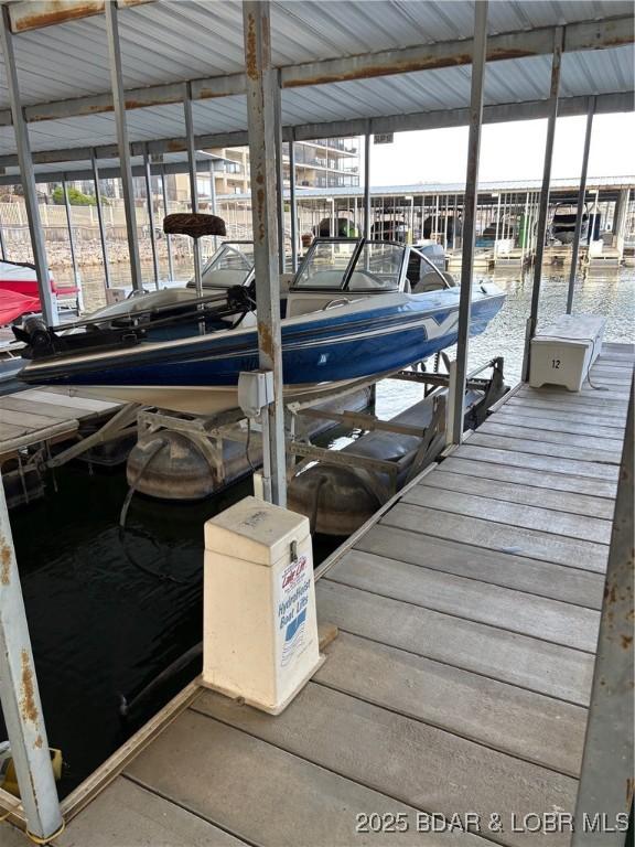 view of dock featuring boat lift
