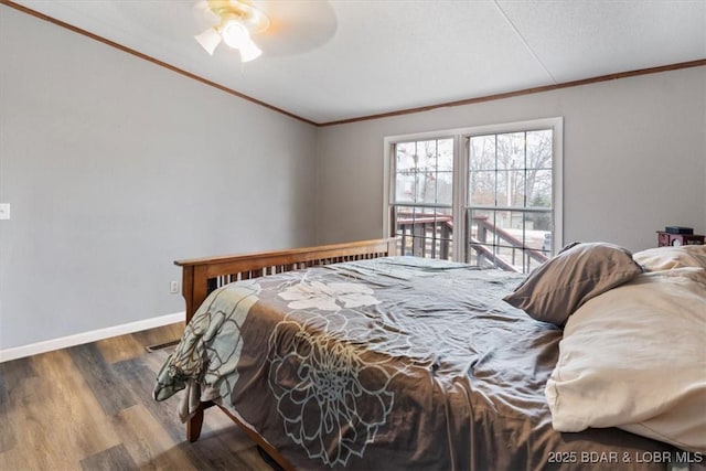 bedroom with ceiling fan, ornamental molding, dark wood-style flooring, and baseboards