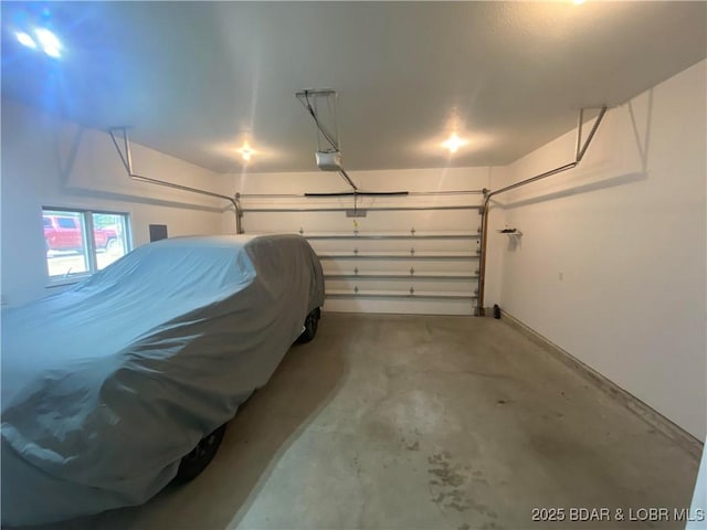 garage featuring a garage door opener