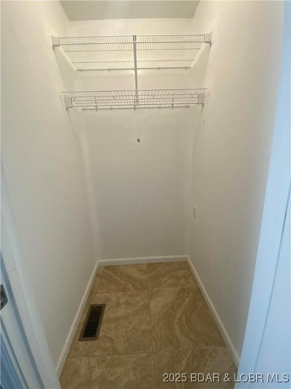 spacious closet with visible vents