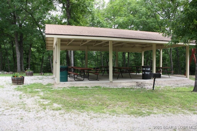 view of property's community featuring a gazebo and a lawn