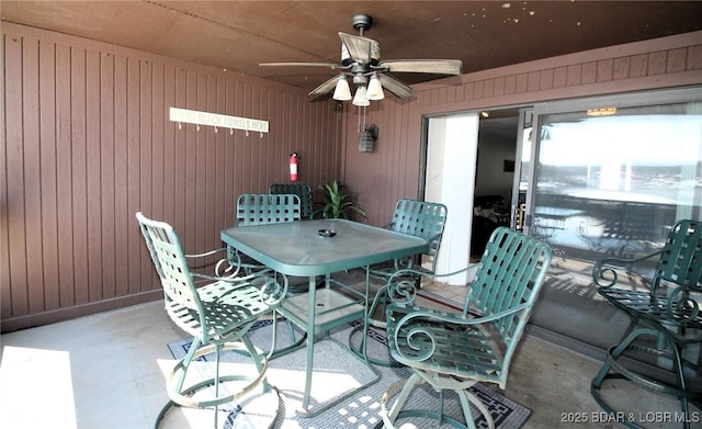 view of patio featuring outdoor dining area and ceiling fan