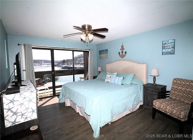 bedroom with ceiling fan, dark wood-style flooring, and access to exterior