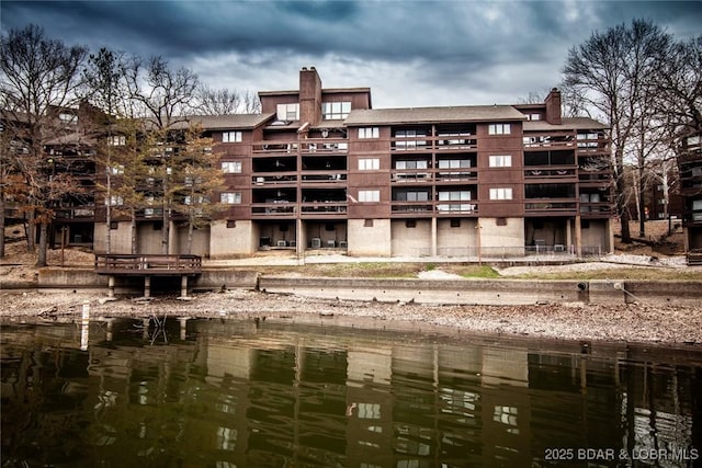 view of building exterior featuring a water view