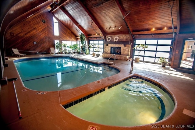 community pool with an indoor hot tub