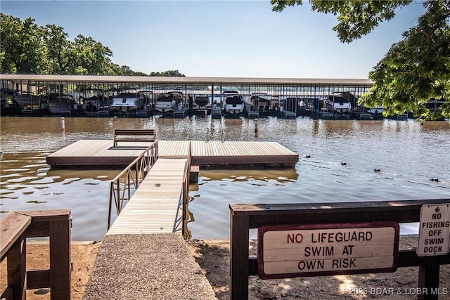 view of dock with a water view