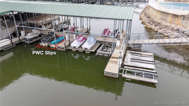 view of dock with a water view and boat lift