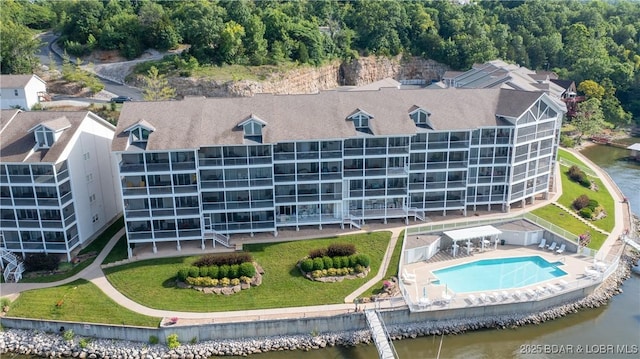 birds eye view of property featuring a water view