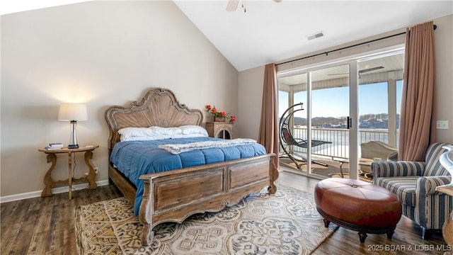 bedroom with visible vents, wood finished floors, a water view, access to outside, and vaulted ceiling