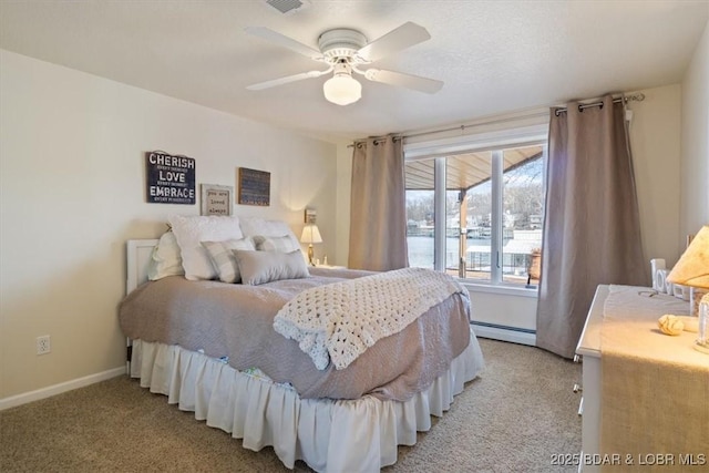 bedroom with baseboards, baseboard heating, a ceiling fan, and light colored carpet