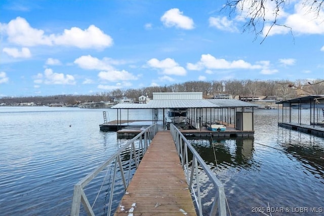 dock area featuring a water view and boat lift