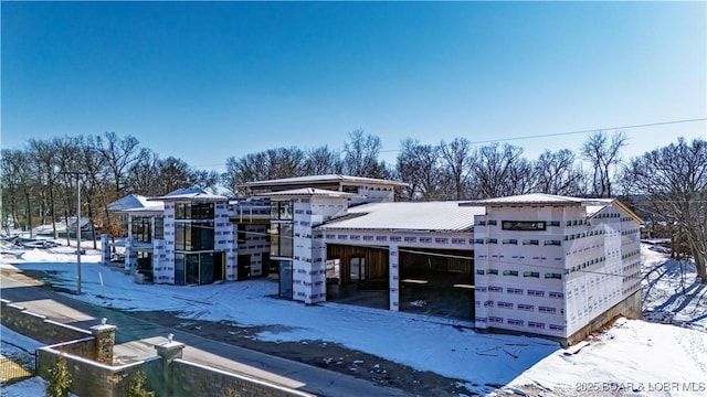 view of snow covered garage