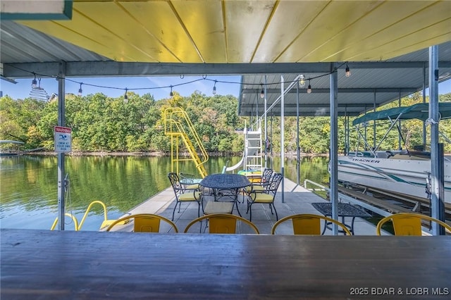 view of dock with a water view and boat lift