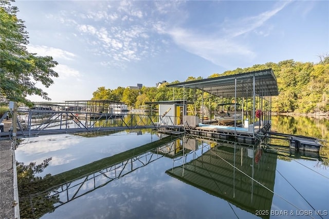 dock area featuring a water view and boat lift