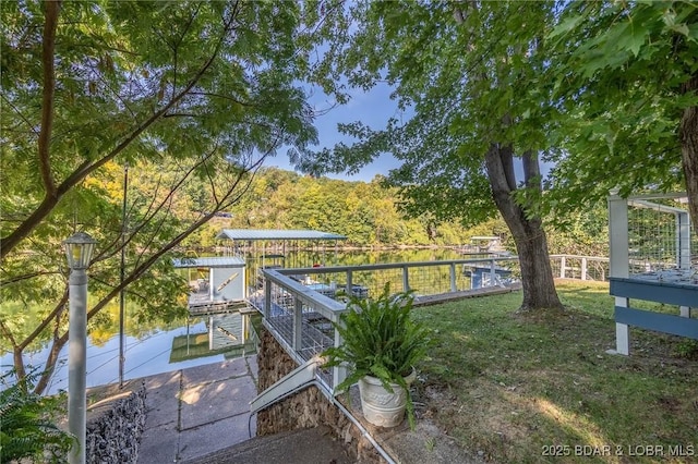 exterior space featuring a boat dock and boat lift