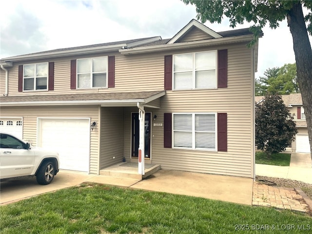 1153 Cedar Dr, Osage Beach, MO 65065 - view of front facade featuring a garage