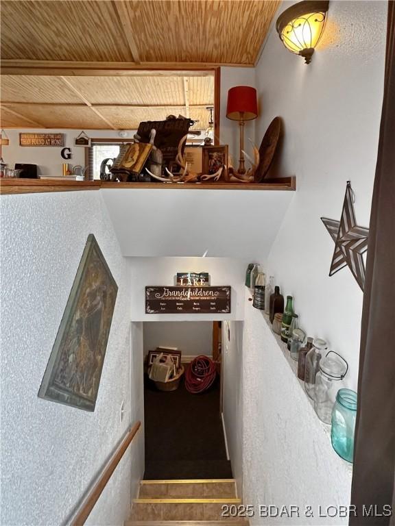 interior space featuring wooden ceiling