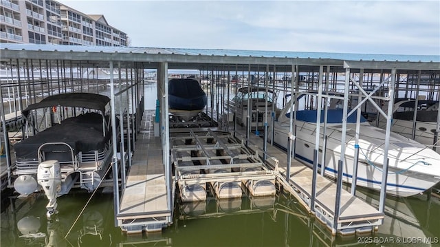 dock area featuring a water view