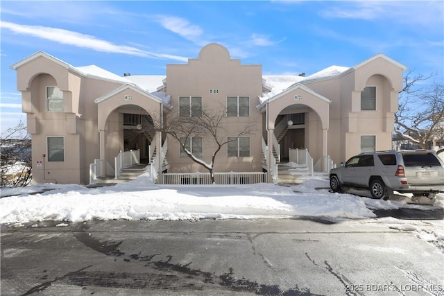 view of front of house featuring stucco siding