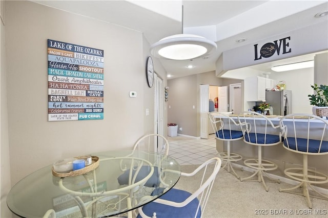 dining room featuring light tile patterned floors