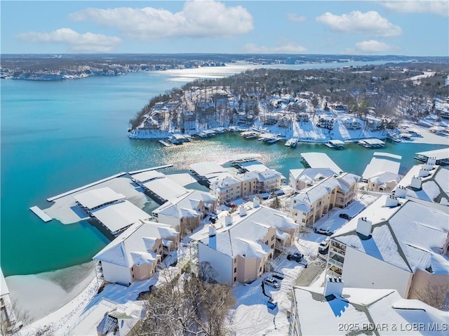 bird's eye view with a water view