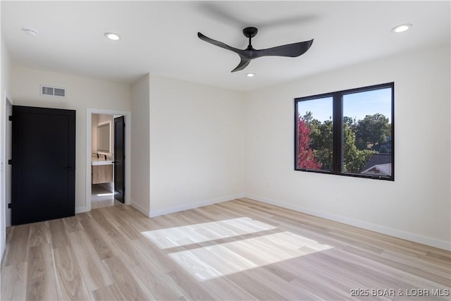 unfurnished bedroom with light wood-style floors, recessed lighting, visible vents, and baseboards