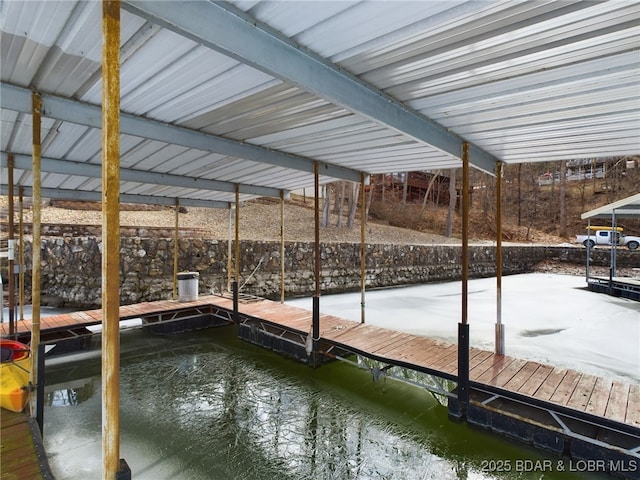 dock area featuring a water view