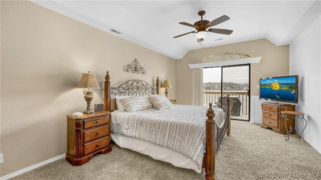 bedroom featuring lofted ceiling, light colored carpet, a ceiling fan, visible vents, and access to exterior