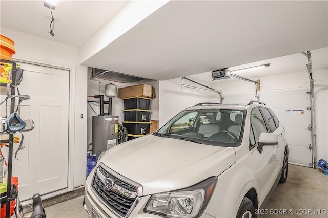 garage with water heater and a garage door opener