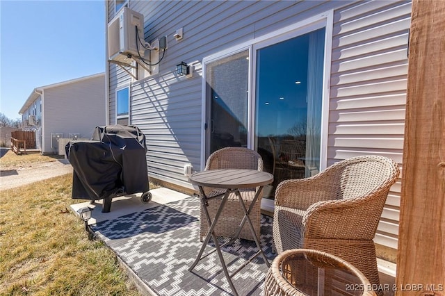 view of patio featuring a grill