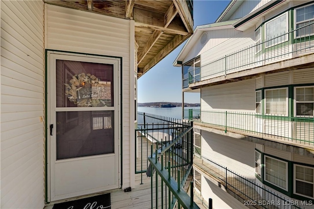 entrance to property featuring a water view