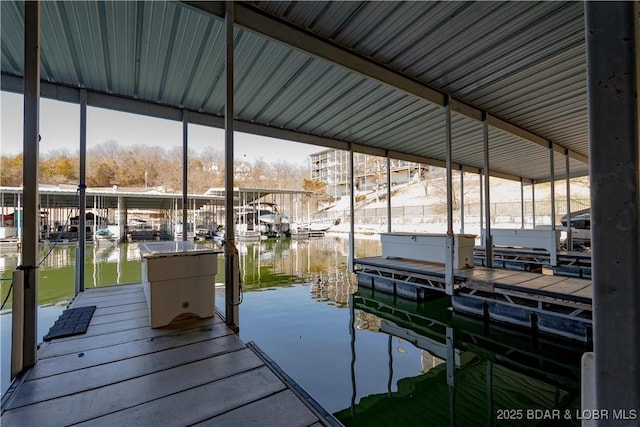 dock area featuring a water view and boat lift