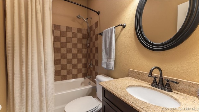 bathroom with a textured wall, shower / bathtub combination with curtain, toilet, and vanity