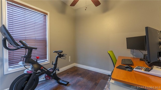 office space featuring ceiling fan, wood finished floors, and baseboards