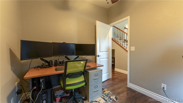 office with baseboards, wood finished floors, and a ceiling fan