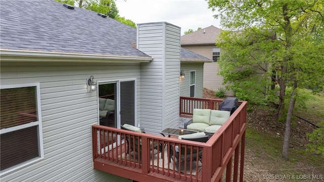 wooden deck featuring an outdoor living space