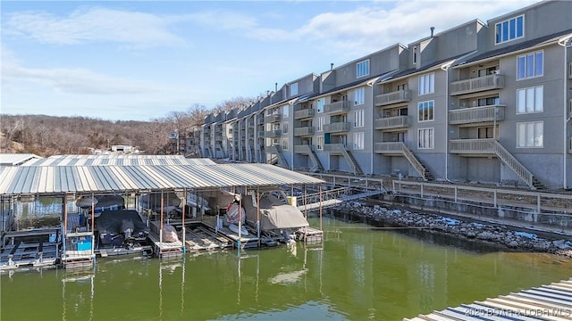 dock area with a water view