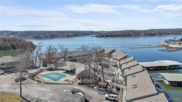 birds eye view of property featuring a water view