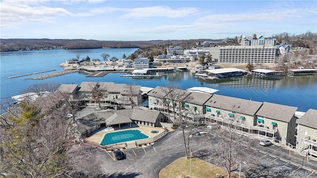 birds eye view of property featuring a water view