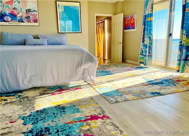 bedroom featuring wood finished floors