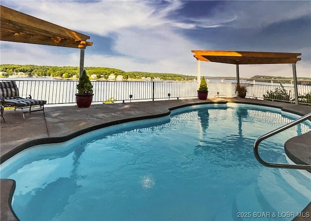 view of pool featuring a water view, fence, a fenced in pool, and a patio