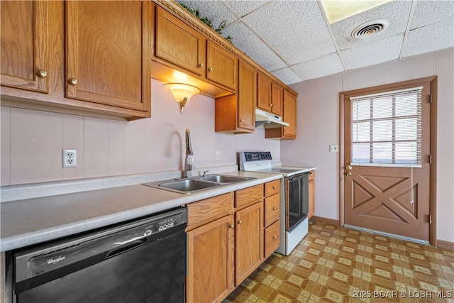 kitchen with white range with electric stovetop, black dishwasher, light countertops, a sink, and under cabinet range hood